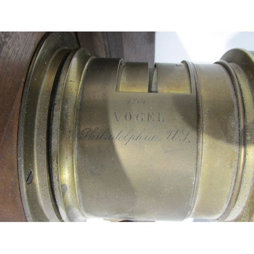 7007 - A late 19th Century mahogany and brass half-plate field camera with a brass (Jules) Vogal of Philade... 