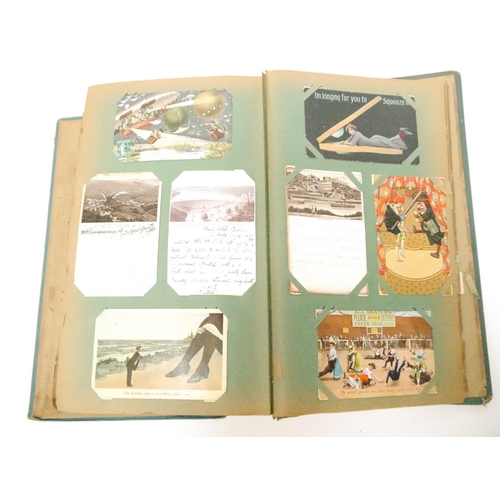 9102 - A large early 20th Century postcard album containing a good quantity (approx. 254) of interesting po... 