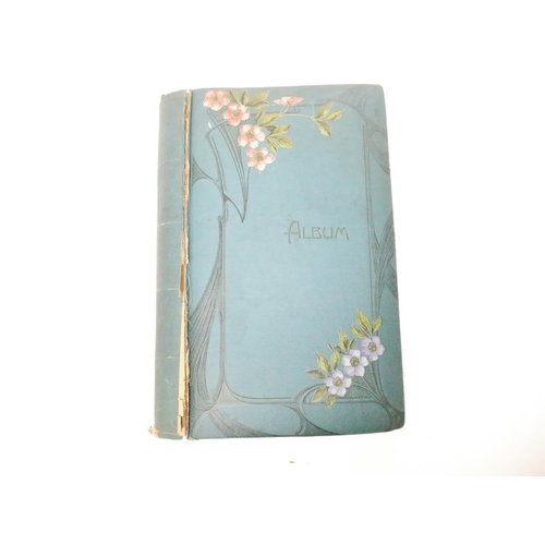 9102 - A large early 20th Century postcard album containing a good quantity (approx. 254) of interesting po... 