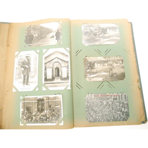 9102 - A large early 20th Century postcard album containing a good quantity (approx. 254) of interesting po... 