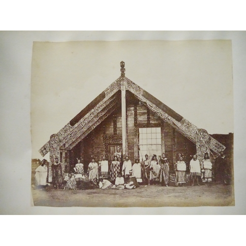 9044 - A 19th Century photograph album containing approx. 100 mounted albumen print etc photographs mainly ... 