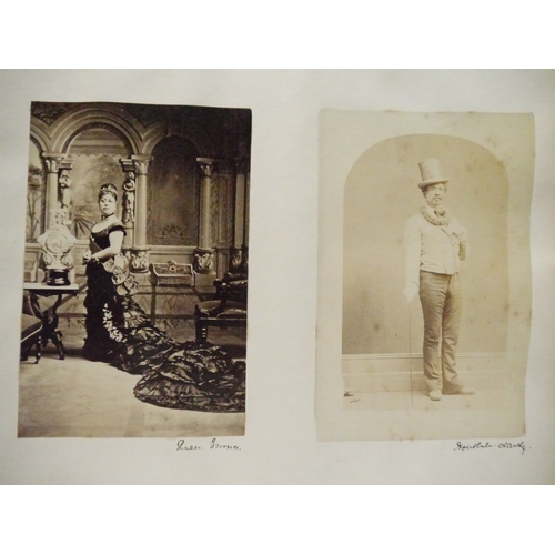 9044 - A 19th Century photograph album containing approx. 100 mounted albumen print etc photographs mainly ... 