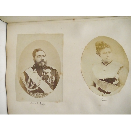 9044 - A 19th Century photograph album containing approx. 100 mounted albumen print etc photographs mainly ... 
