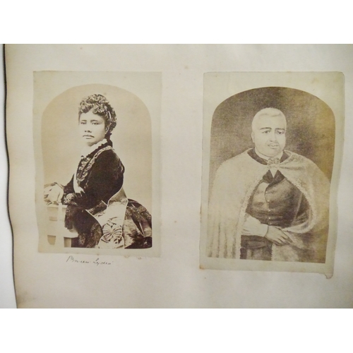 9044 - A 19th Century photograph album containing approx. 100 mounted albumen print etc photographs mainly ... 