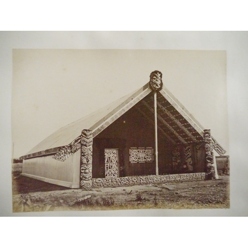 9044 - A 19th Century photograph album containing approx. 100 mounted albumen print etc photographs mainly ... 