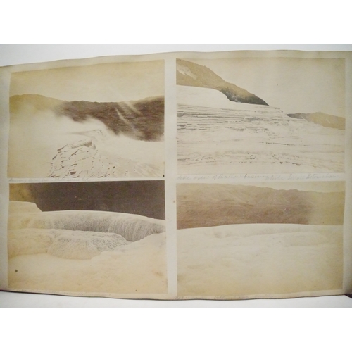 9044 - A 19th Century photograph album containing approx. 100 mounted albumen print etc photographs mainly ... 