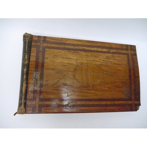 9044 - A 19th Century photograph album containing approx. 100 mounted albumen print etc photographs mainly ... 