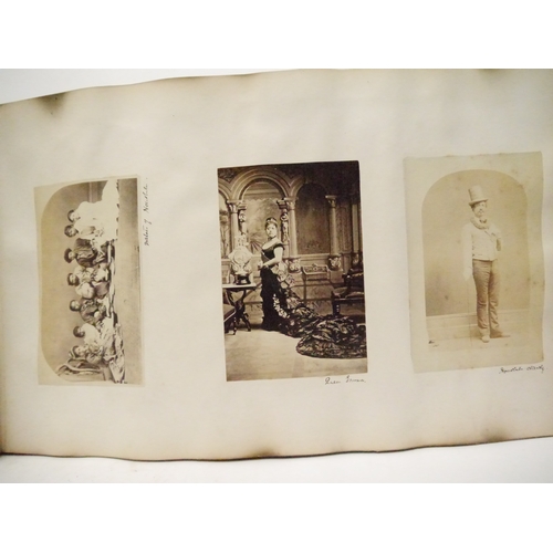9044 - A 19th Century photograph album containing approx. 100 mounted albumen print etc photographs mainly ... 