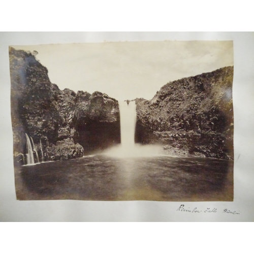 9044 - A 19th Century photograph album containing approx. 100 mounted albumen print etc photographs mainly ... 
