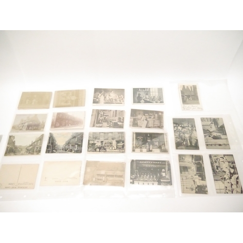 9117 - A collection of approx. 100 postcards of tradespeople, industry, shops, high streets, labourers etc,... 