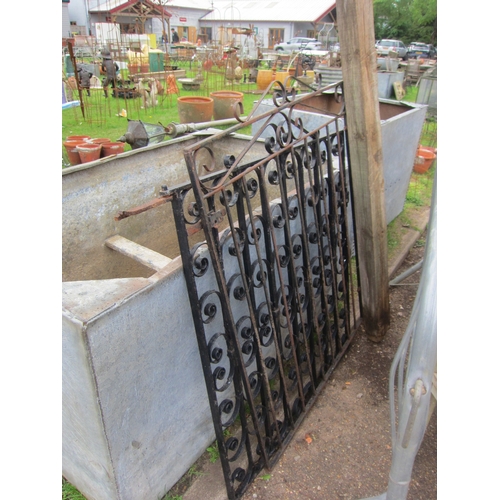 8042 - Two scrolled iron gates