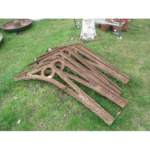 8045 - Six cast iron roof brackets