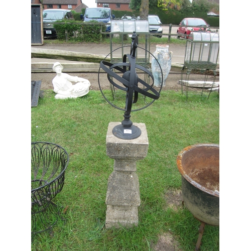 8051 - A concrete baluster plinth with decorative armillary top, total height 115cm