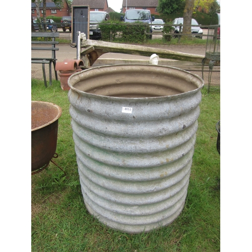8053 - A corrugated water tank, 67cm diameter x 78cm high