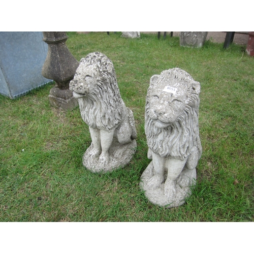 8055 - A pair of composition seated lions, 54cm tall
