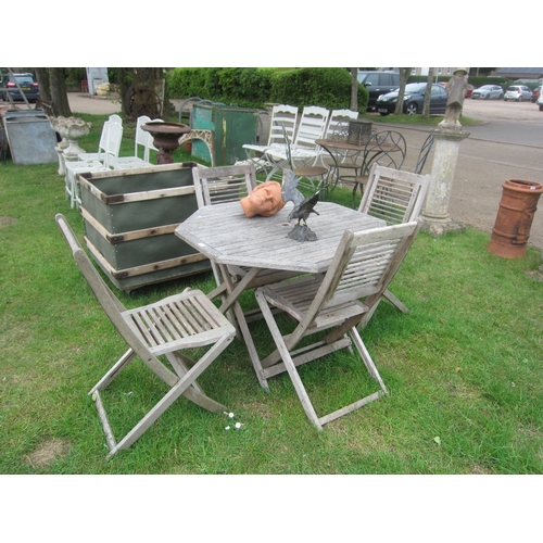 8061 - A hardwood garden table and four chairs