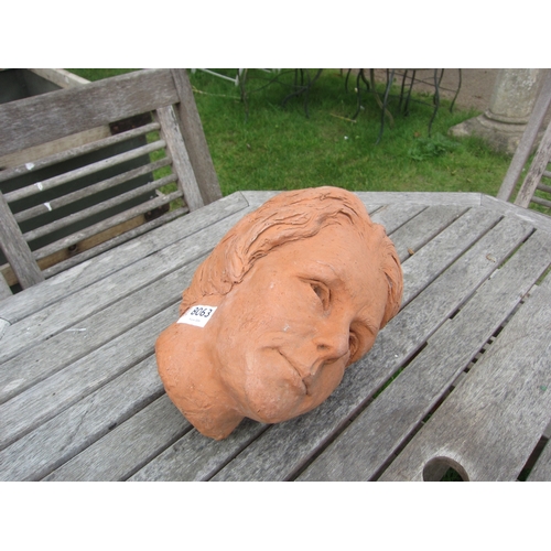 8063 - A clay bust of a lady, approx 29cm tall
