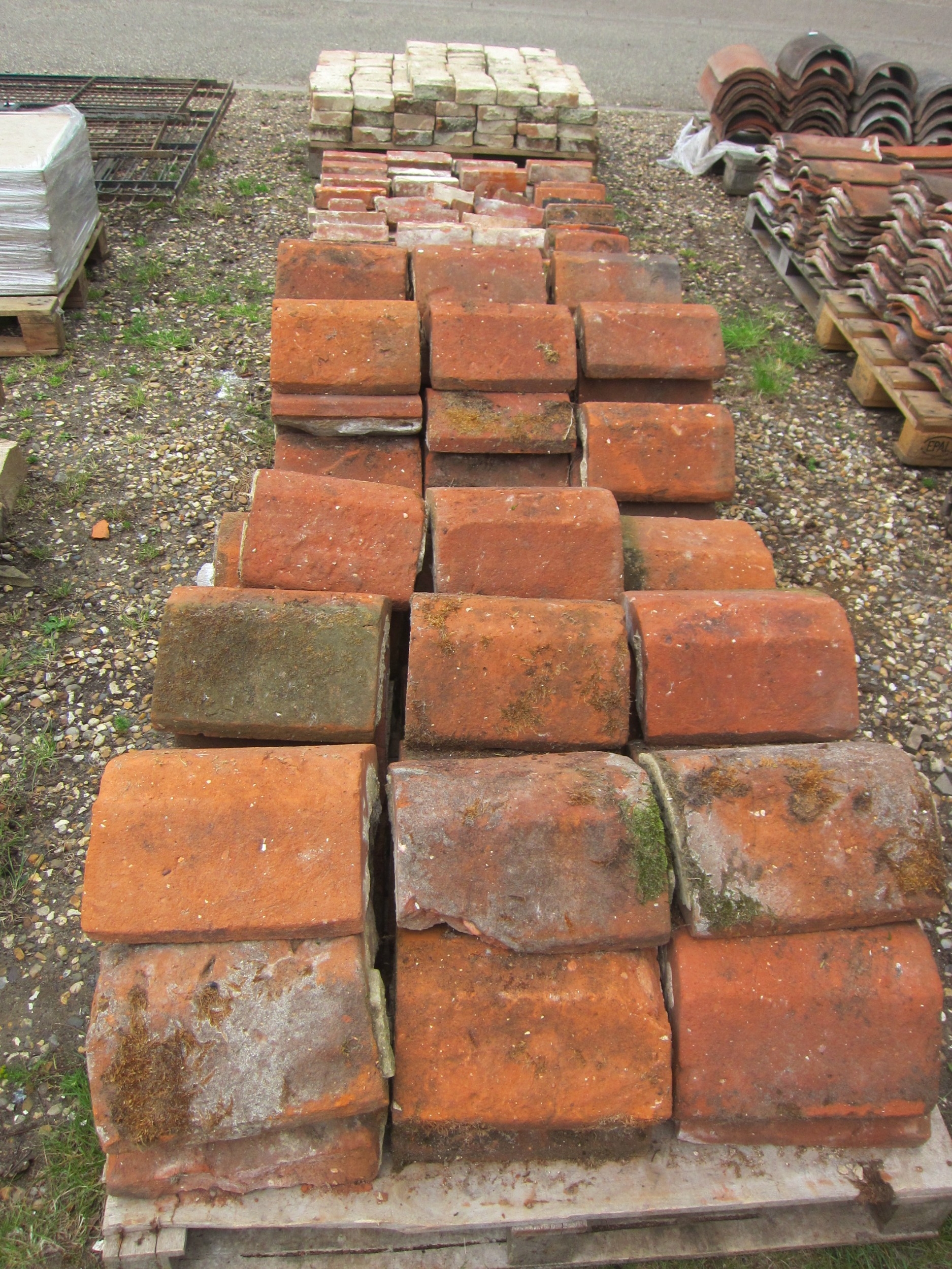 Three pallets of reclaimed coping bricks and slips