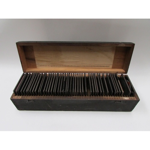 7031 - A box of coloured magic lantern slides relating to The Boer War of 1900, 44 out of 50