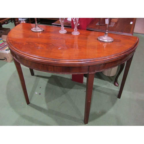 4016 - A Victorian mahogany D-end table. 78cm tall x 134cm wide x 67cm deep