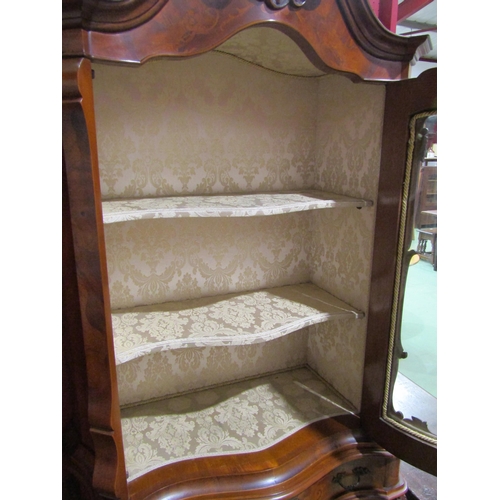 4056 - An Italian 19th Century style inlaid serpentine front vitrine the glazed single door with carved ped... 
