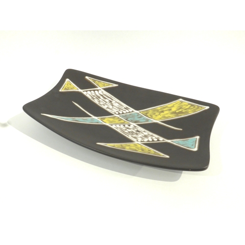 7034 - A Danish Soholm Pottery rectangular shallow dish in black with geometric design in blue, yellow and ... 