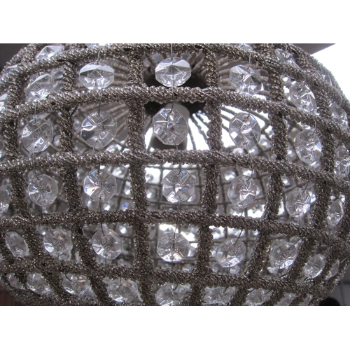 2021 - A pair of gilt metal and bead work hanging lights