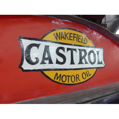 2059 - An alloy display cabinet, one payne missing, the top painted Wakefield Castrol Motor Oil