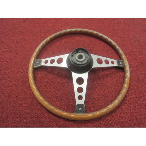 8014 - A wooden and alloy steering wheel from an Austin Healey MK1 Sprite