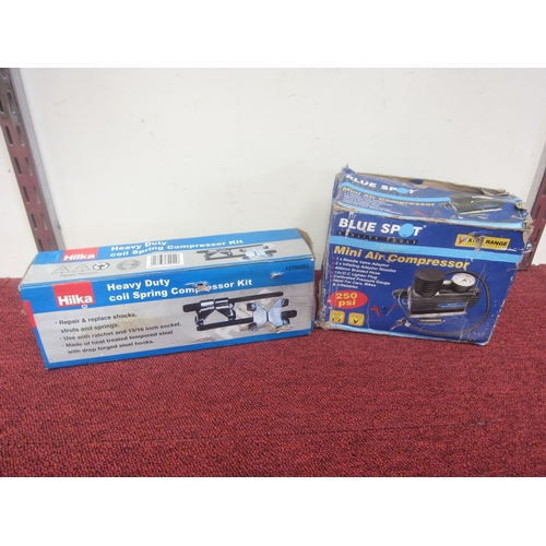 8033 - A boxed Hilka coil spring compressor kit and a boxed Blue Spot mini air compressor