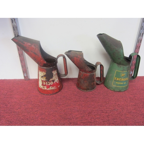 8039 - Three oil jugs including Shell and B.P.