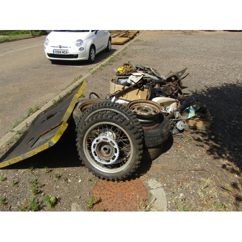 8001 - A large quantity of mainly Mini spares including wheels and motorcycle spares, etc