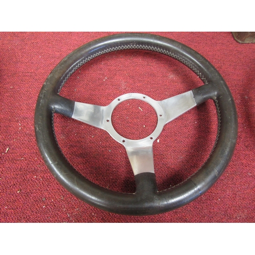 8015 - A chrome and leather steering wheel