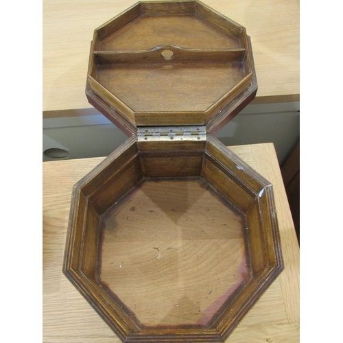 1039 - An early 20th Century oak veneered sewing box of octagonal form, together with a floral marquetry in... 
