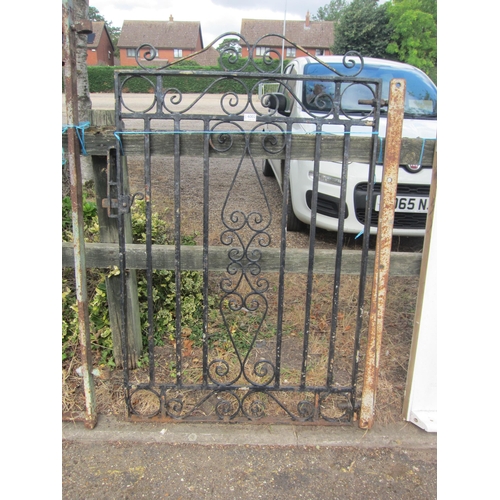 6002 - A scrolled iron side gate, 85cm (w) x 135cm (h)