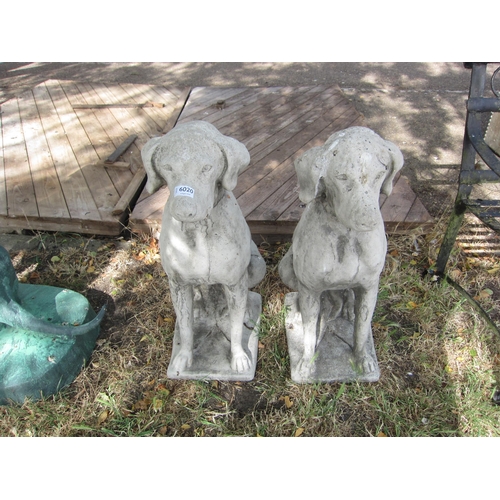 6020 - A pair of seated composition hounds, approx 70cm tall, one back corner damaged