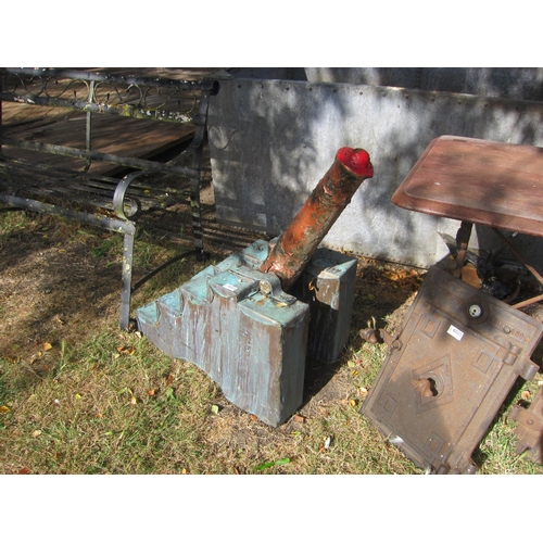 6022 - A cast iron cannon on stepped wooden, copper covered base