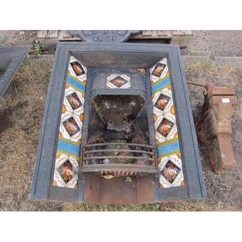 6045 - A cast iron tiled fire insert