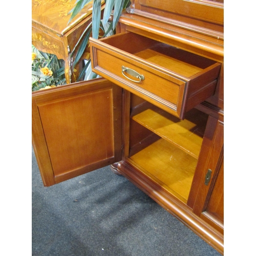 1034 - A three glazed door dresser over a three drawer and three door cupboard base with key, 220cm tall x ... 