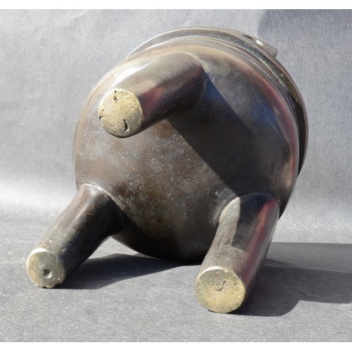 7001 - A bronze 18thc Chinese silver inlaid twin handled tripod ding (censer) profusely inlaid arcahaic sty... 