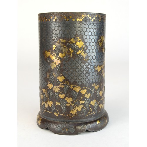 7005 - A Japanese bronze and mixed metal cylindrical vase decorated with fruiting grape vines in gold and s... 