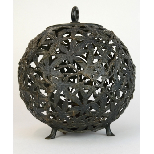 7002 - A bronze Japanese spherical openwork lantern decorated with bamboo leaves, converted to hold a light... 