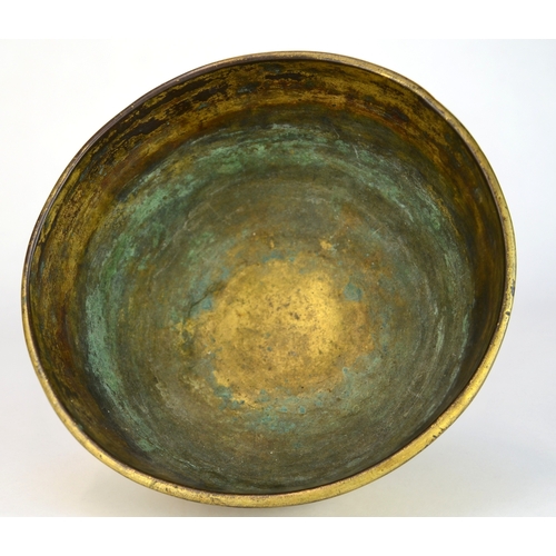7003 - A Japanese gilt brass pedestal bowl decorated with incised flowers and mons

 10cm high

 Provenance... 