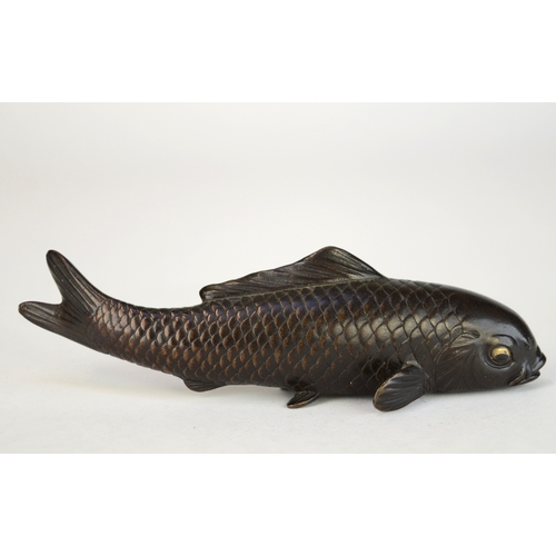 7007 - A Japanese bronze okimono of a carp, signed

 9.5cm wide

 Provenance
 Henry Potter Stevens Collecti... 