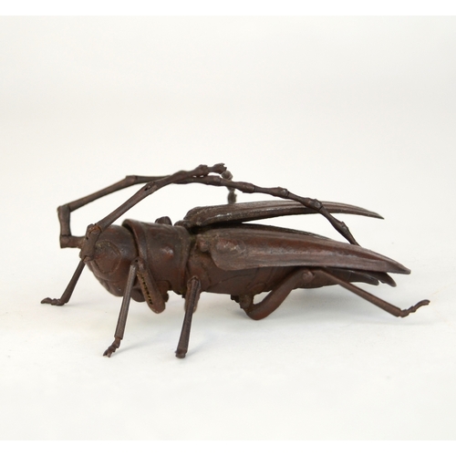 7008 - A Japanese jizai okimono of an articulated Asian long horned beetle, signed under wing

 Provenance
... 
