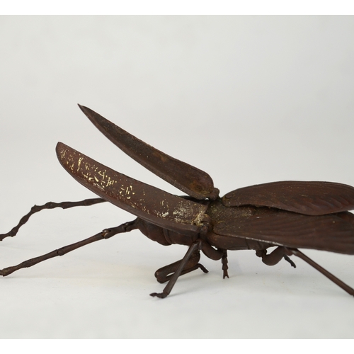 7008 - A Japanese jizai okimono of an articulated Asian long horned beetle, signed under wing

 Provenance
... 