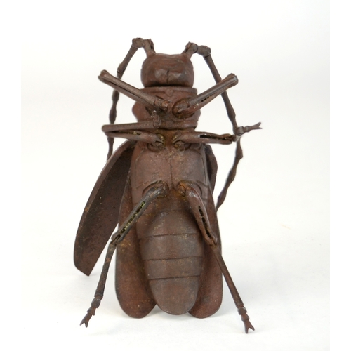 7008 - A Japanese jizai okimono of an articulated Asian long horned beetle, signed under wing

 Provenance
... 