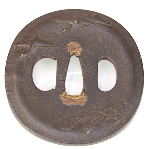 7013 - An iron circular tsuba decorated in relief with geese with silver hirazogan moon, gold seal

 Proven... 