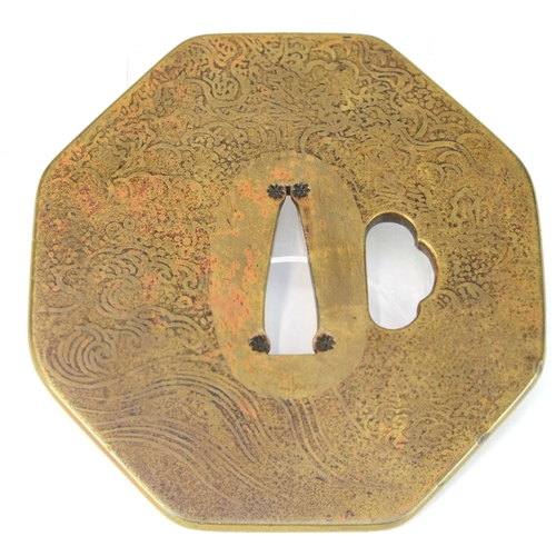 7014 - An octagonal sentoku tsuba decorated with an acid etched pattern, signed

 Provenance
 Henry Potter ... 
