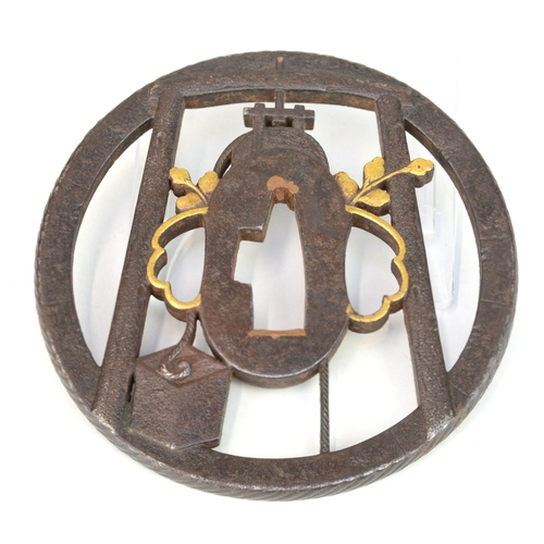 7017 - MASATADA- An iron openwork tsuba in the form of a well, signed

 Provenance
 Henry Potter Stevens Co... 